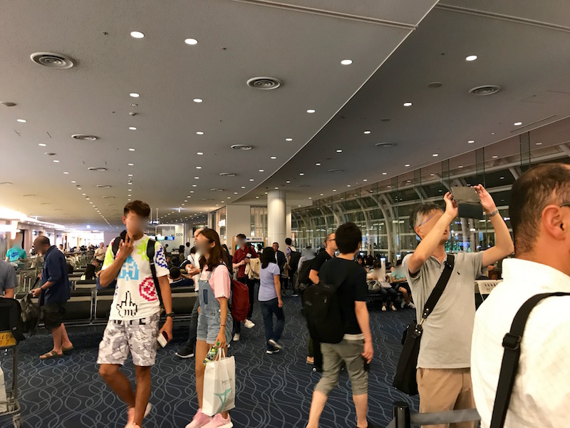 Crowds At The Gate Waiting For Boarding