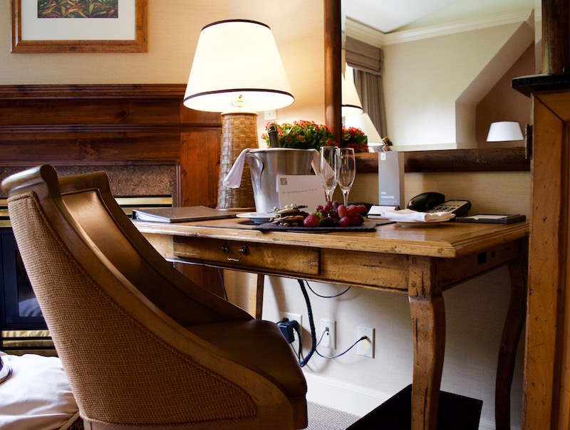 Gold Floor Room Desk With Welcome Amenity